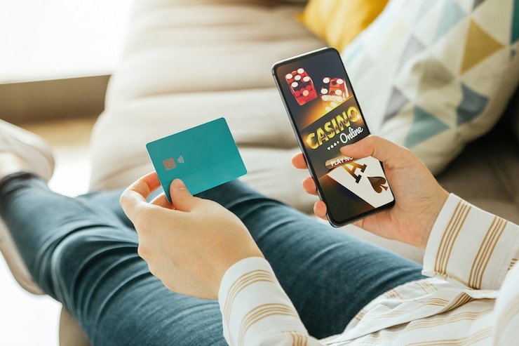 exototo slot mobile app interface showing slot games and live casino options